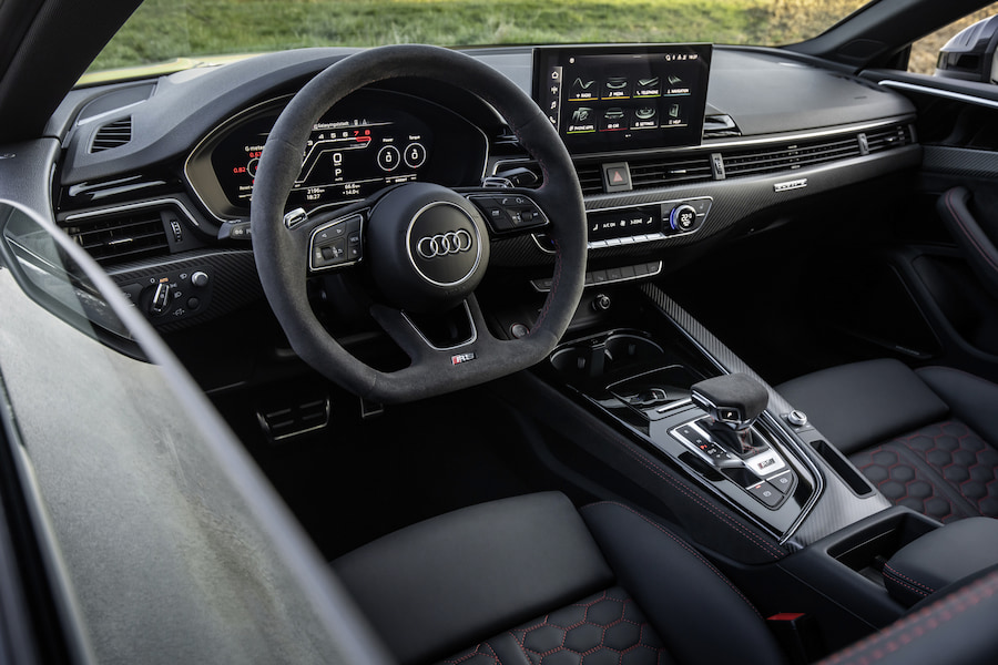 //images.ctfassets.net/uaddx06iwzdz/Dvvb9wIszmN1bN4mKim9B/a6dbf1f717f327da07e4e4006eb69706/audi-rs5-interior.jpg "Audi RS5 Interior"