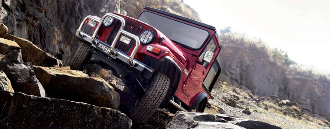 4ngRXCnucevUTKVFScwGA4-713360a9f1c1dee17b77df5f842413e7-mahindra-thar-l-02-1100