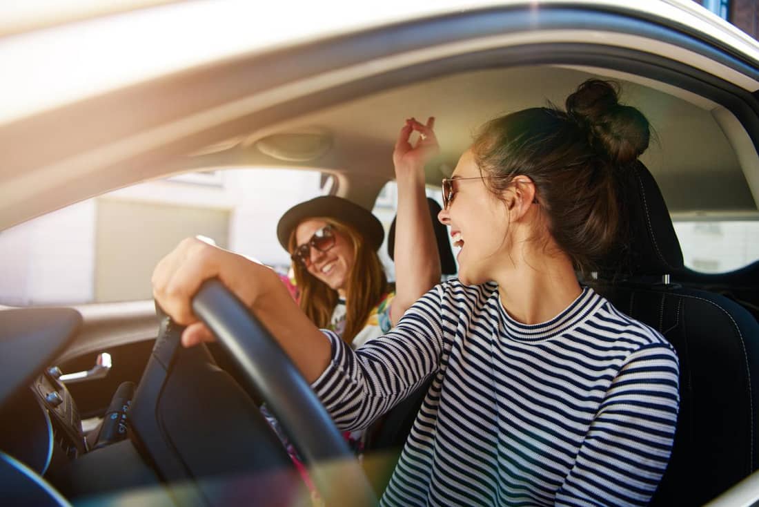 driver, women having fun in car