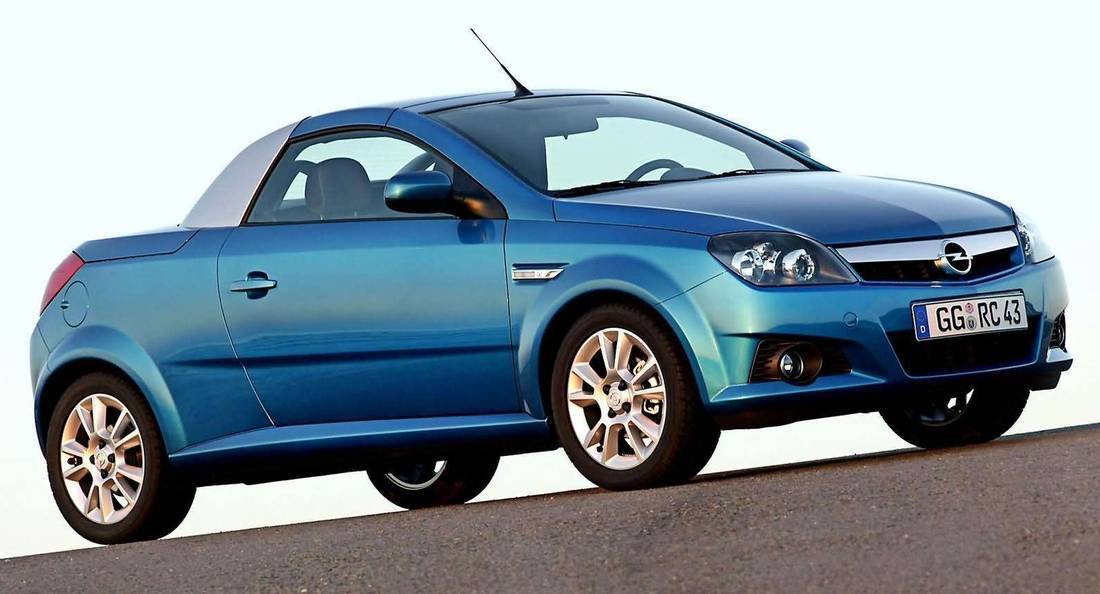 2h9znlNeq9QpHtawMeqsQY-67551c868fe51179da0f56f4e0556007-opel-tigra-twintop-side-1100.jpg